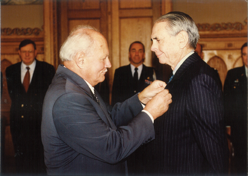 Donald receiving the Middle Cross of the Republic of Hungary