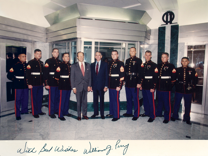 With Secretary of Defense Perry and Marine Guard